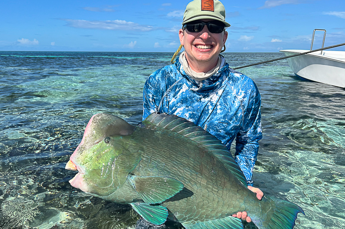 Spencer with a bumphead parrotfish caught fly fishing at Farquhar, Seychelles.