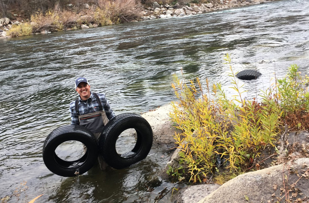 Removing tire from the Spokane River