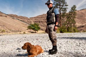 Ed taking a break while Sean checks out a run on the Grande Ronde. 