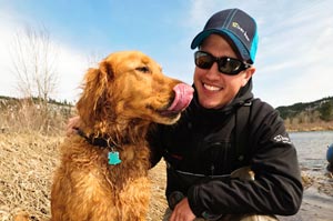 Ed Visintainer giving his master Sean a patented Chomp Lick on the banks of the lower Coeur d'Alene River.