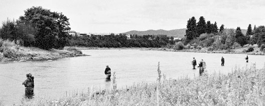 Spey Casting student lined up on the Spokane River practicing casting.