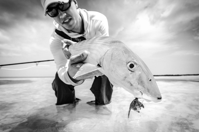 Sean Visintainer holding a Bahamas Bonefish.