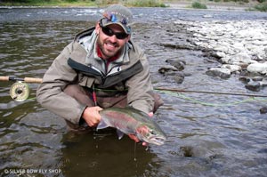 Silver Bow guide Josh Seaton and the buck getting their grip and grins for the website taken.