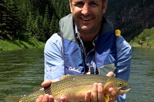 Client Rick Roddis with a solid Westslope Cutthroat from a guided North Fork of the Coeur d'Alene trip in June.