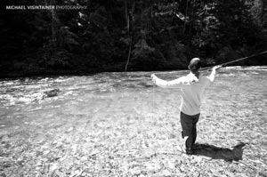Sean Visintainer digs back to launch a cast to rising cutthroat trout on the North Fork of the Coeur d'Alene River.