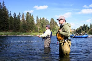 Silver Bow guide Britten Jay overseas his client fish the Spokane River.