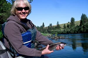 Gloria's first fish on her guided float trip down the Spokane River.