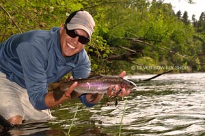 Sean Visintainer wade fishing the Spokane River on his day off for trout.