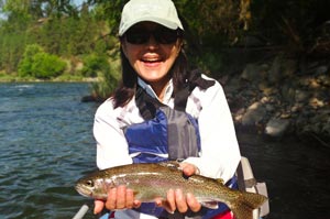 With only a few hours fly fish, a happy client learns how to catch trout on the Spokane.