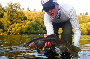 Our good friend Ty Comeau with a great rainbow trout from the Spokane River.