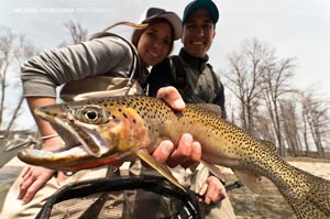 Sean and Allie with a male Westslope Cutthroat Trout that took a large skwala dry fly in April on the St. Joe.