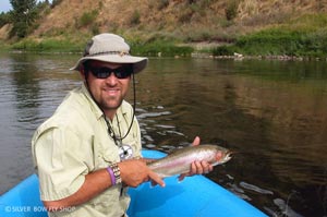 Britten railing another Clark Fork Rainbow on the San Juan Worm.