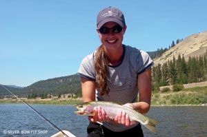 Krissy posing with a nice Clark Fork cuttbow caught during the summer.