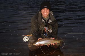Sean posing with one of numerous rainbows caught in January on the Clark Fork River.